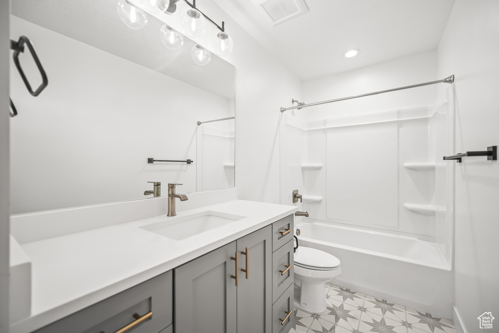 Full bathroom with vanity,  shower combination, tile patterned floors, and recessed lighting