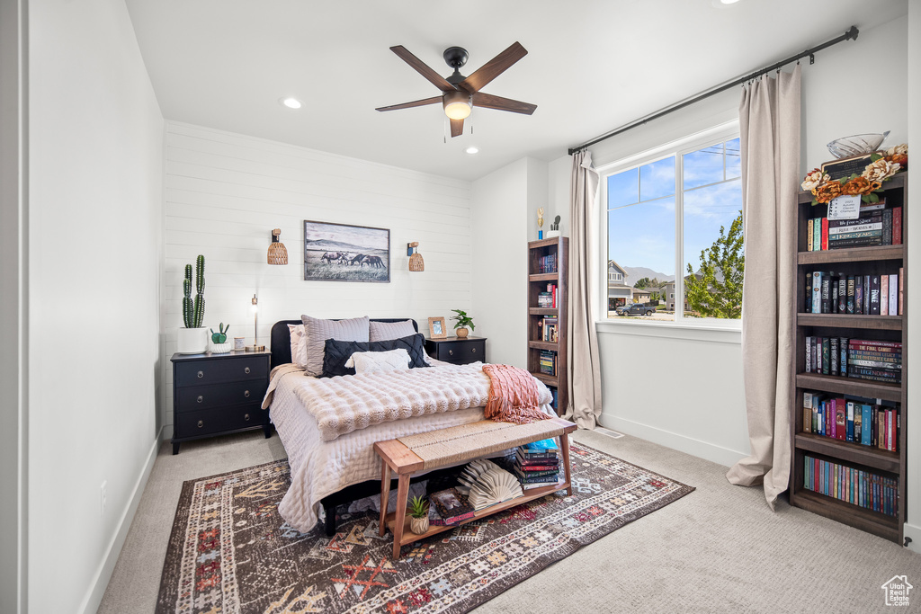 Bedroom featuring light colored carpet, recessed lighting, and ceiling fan