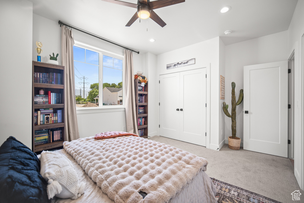 Bedroom featuring carpet, recessed lighting, a closet, and ceiling fan