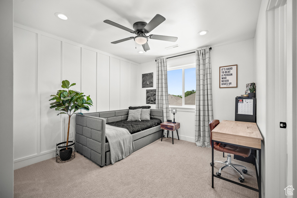 Home office with recessed lighting, a ceiling fan, and carpet flooring