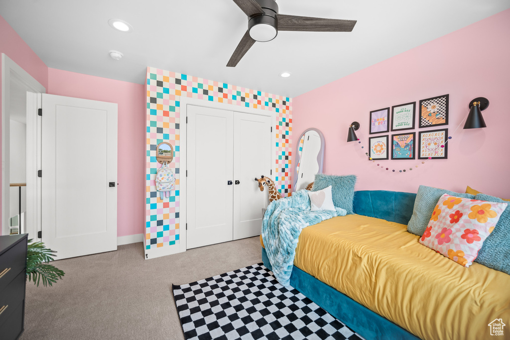 Bedroom featuring a ceiling fan, a closet, recessed lighting, and carpet