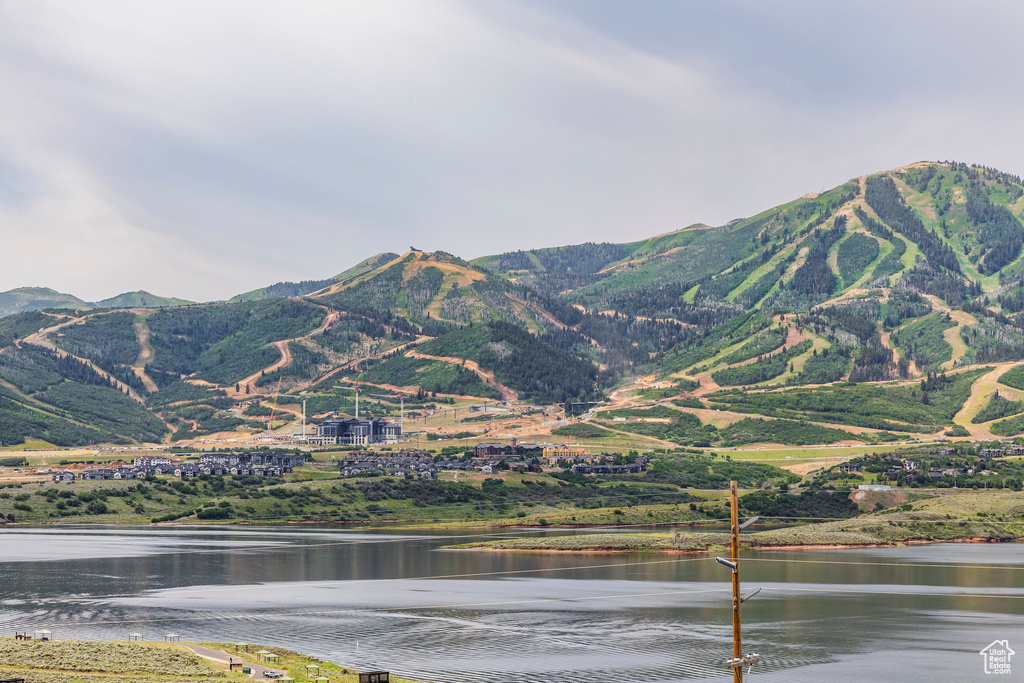 View of mountain backdrop with a nearby body of water