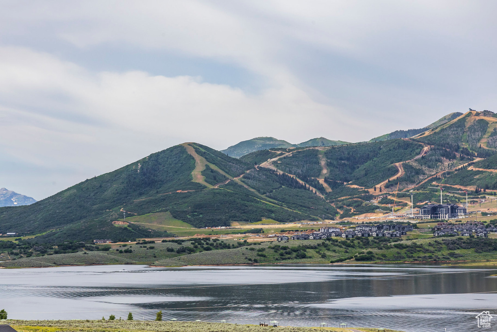 Mountain view featuring a nearby body of water