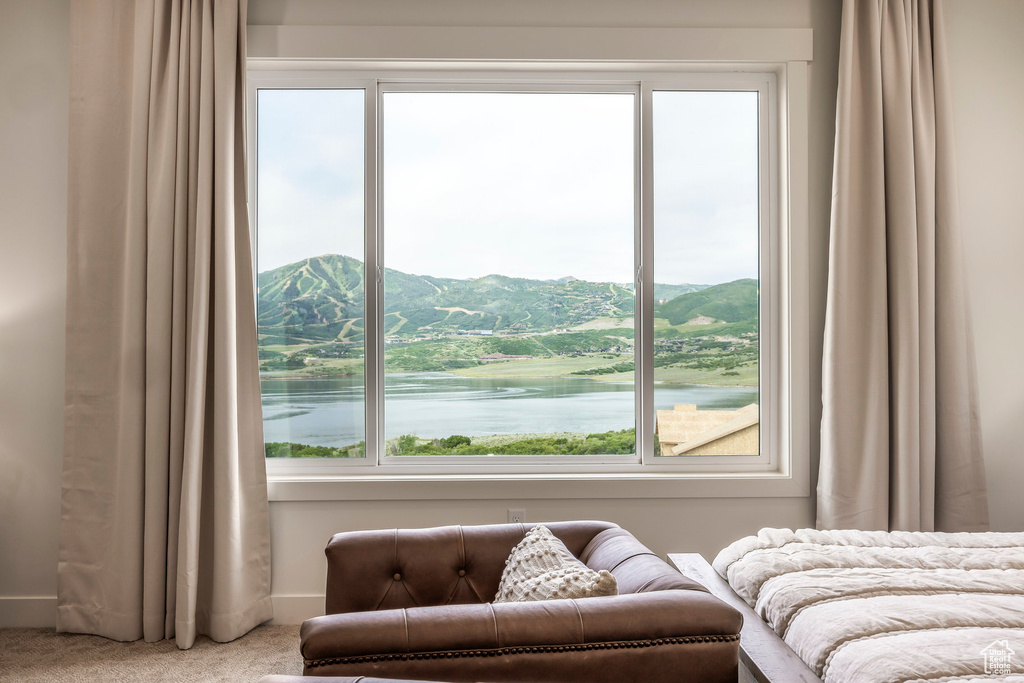 Bedroom with carpet and baseboards