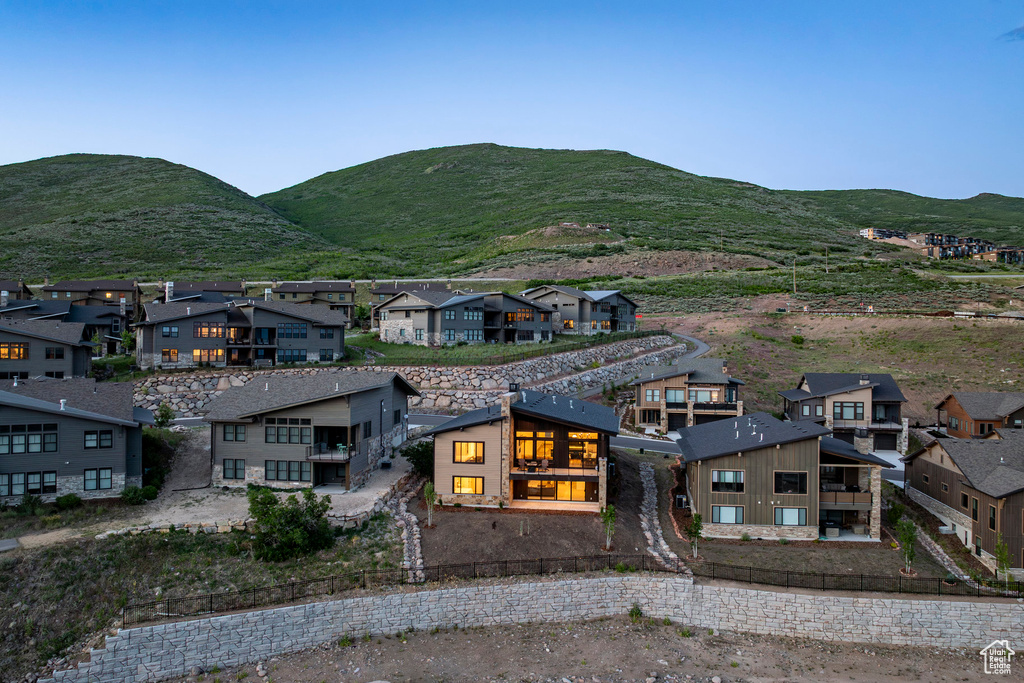 View of mountain background featuring nearby suburban area