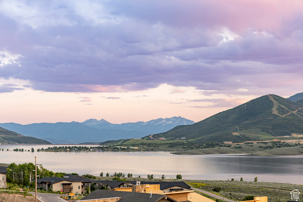 View of mountain backdrop with a nearby body of water