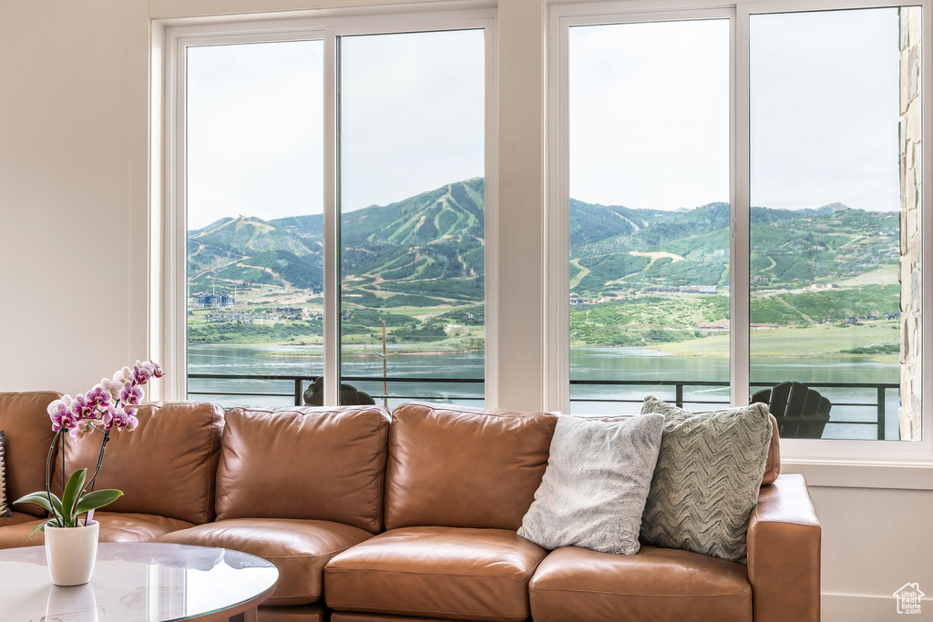 Living room featuring plenty of natural light and a mountain view