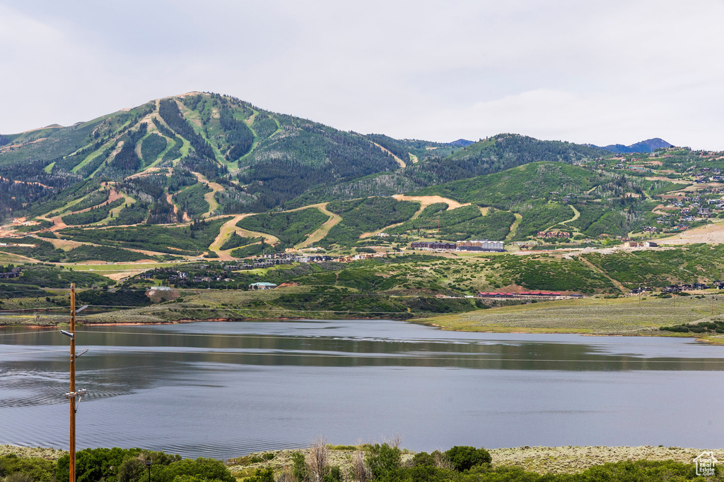 View of mountain background with a nearby body of water