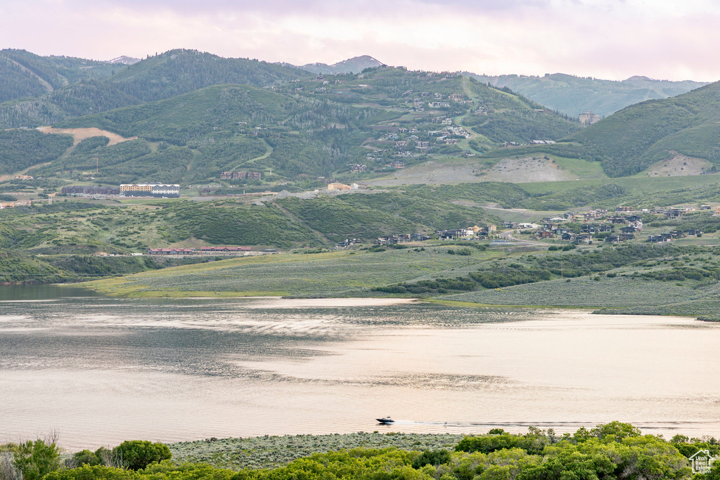 View of mountain background featuring a nearby body of water