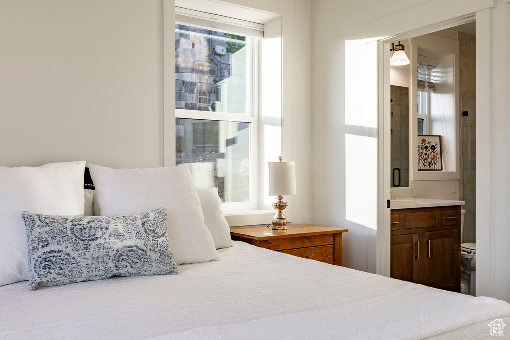 Bedroom featuring ensuite bathroom