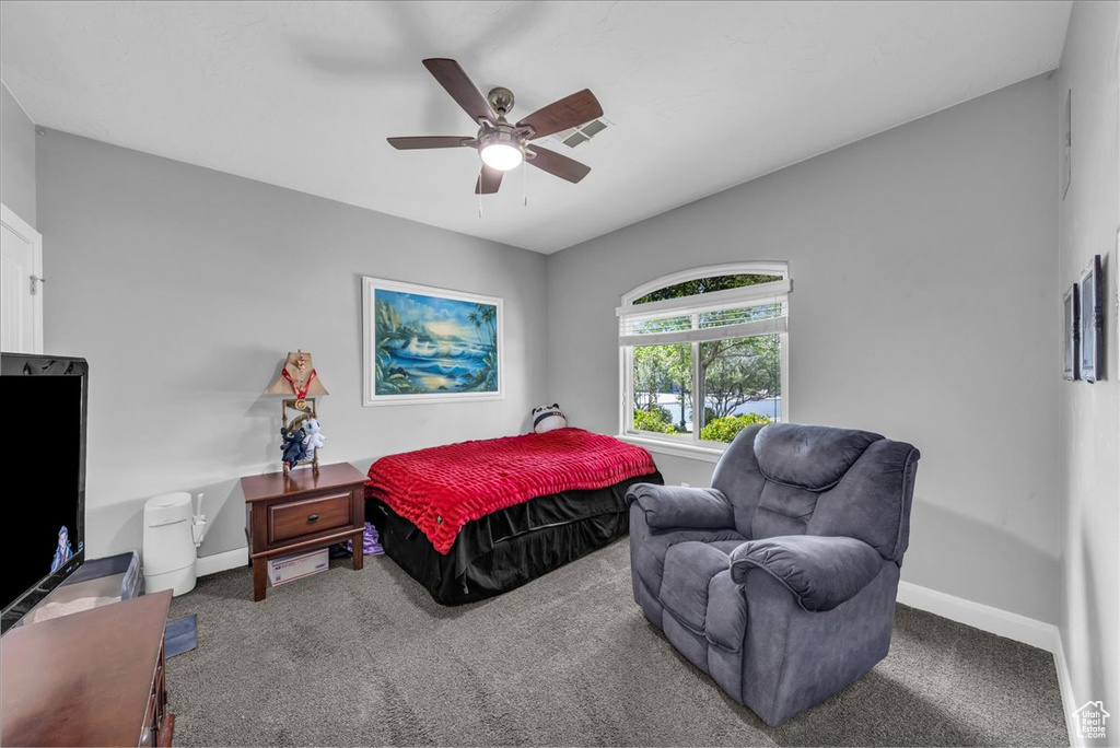 Bedroom featuring carpet flooring and a ceiling fan