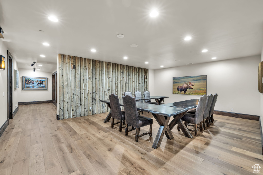 Dining space with recessed lighting and light wood-style floors