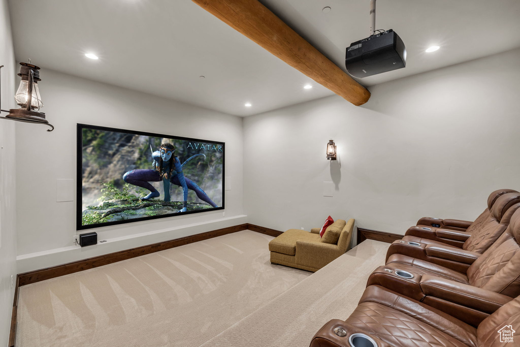 Home theater room featuring recessed lighting, carpet flooring, and beam ceiling
