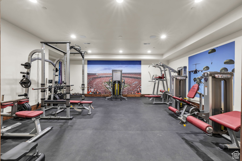 Workout area featuring recessed lighting