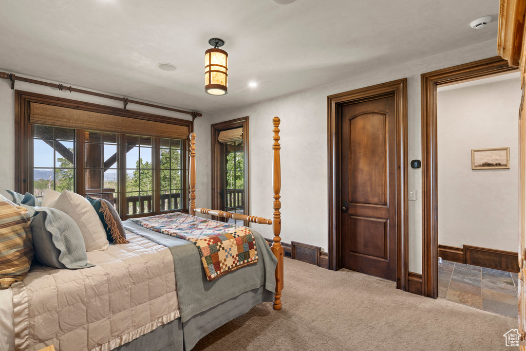 Bedroom with access to outside, carpet floors, and recessed lighting