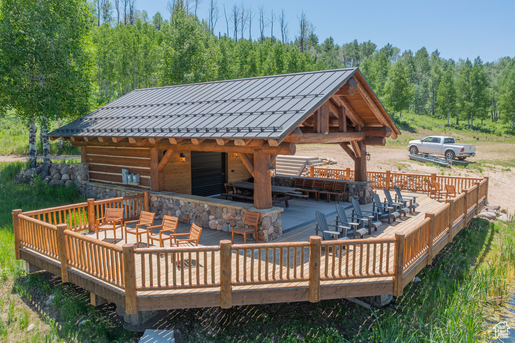 Wooden terrace with a wooded view