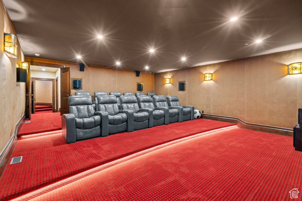 Cinema room featuring carpet and recessed lighting