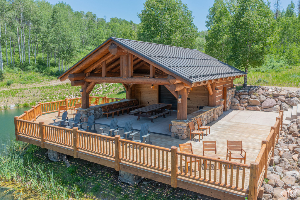 Dock with a forest view and a wooden deck