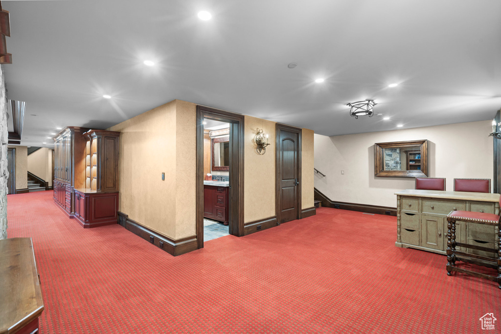 Office space with carpet and recessed lighting