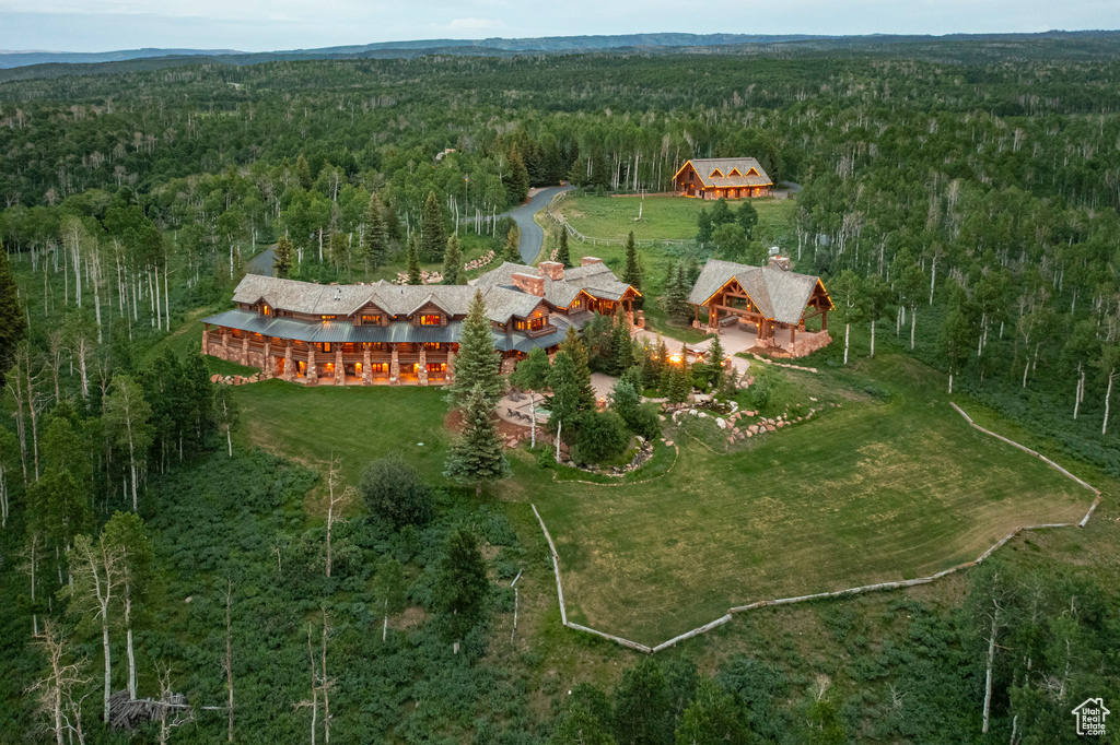 View of property location featuring a heavily wooded area