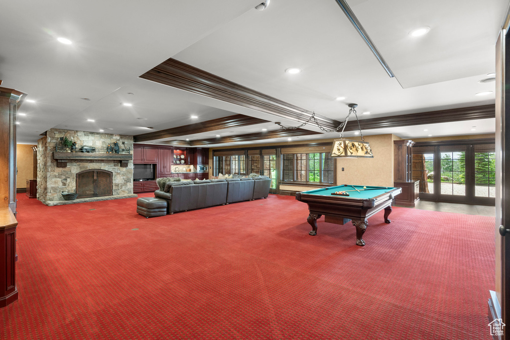 Playroom with pool table, a fireplace, carpet flooring, ornamental molding, and recessed lighting