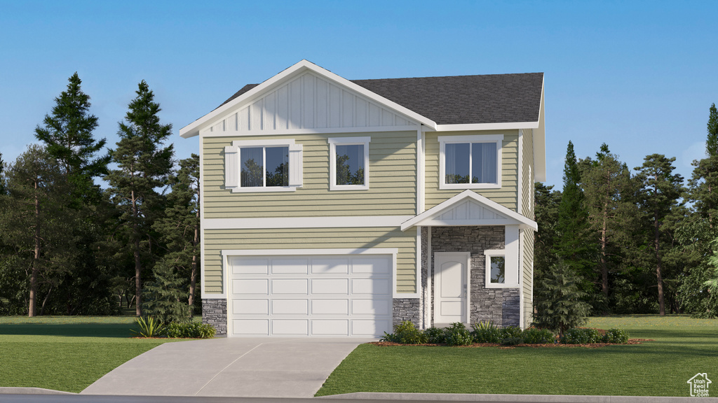 View of front of home with stone siding, board and batten siding, a front lawn, driveway, and a garage