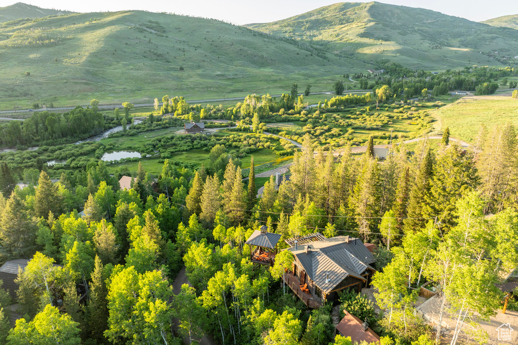 View of mountain backdrop featuring rural landscape