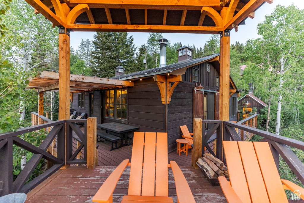 Deck with view of scattered trees