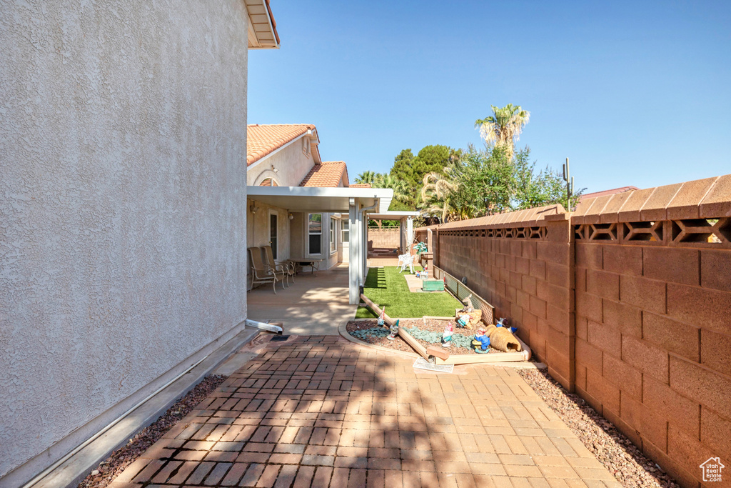 Deck featuring a patio and a fenced backyard