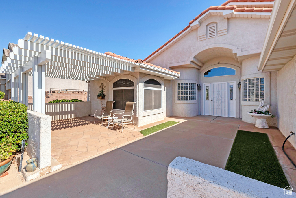 View of patio featuring a pergola