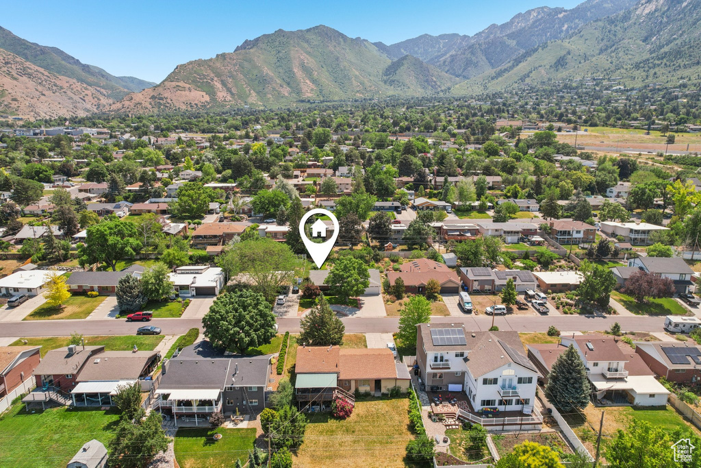 Aerial view of residential area with mountains
