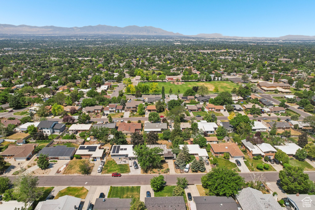 Aerial perspective of suburban area featuring mountains