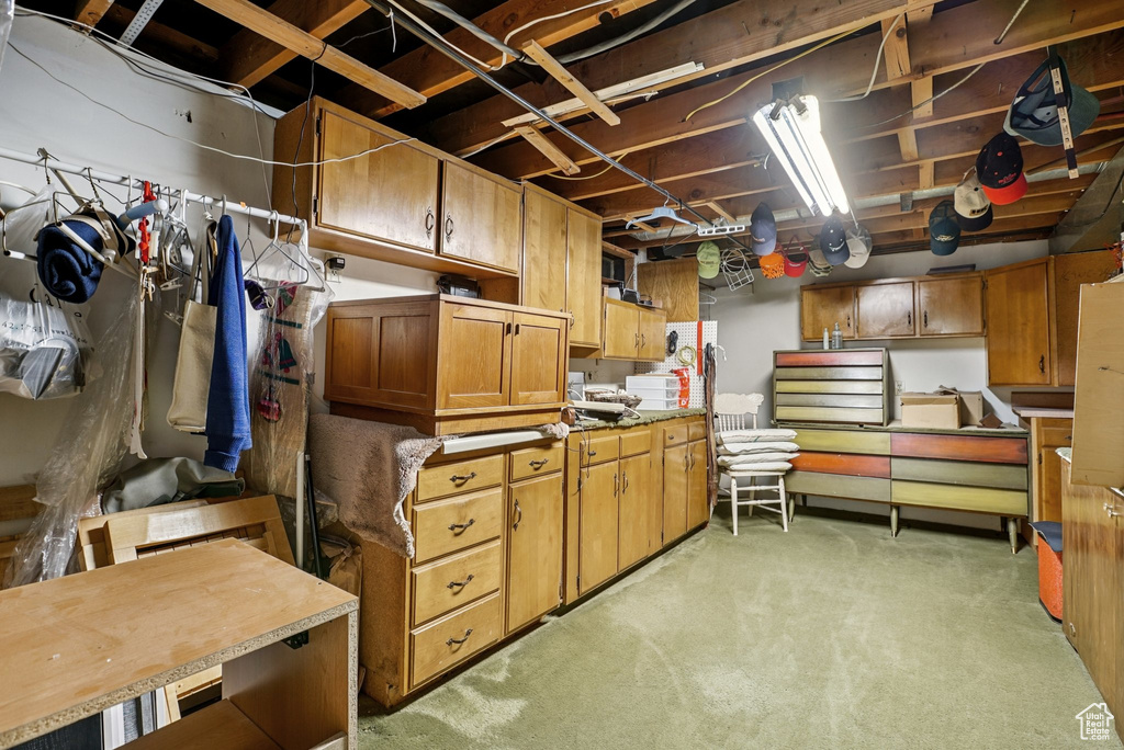 Unfinished below grade area with light carpet