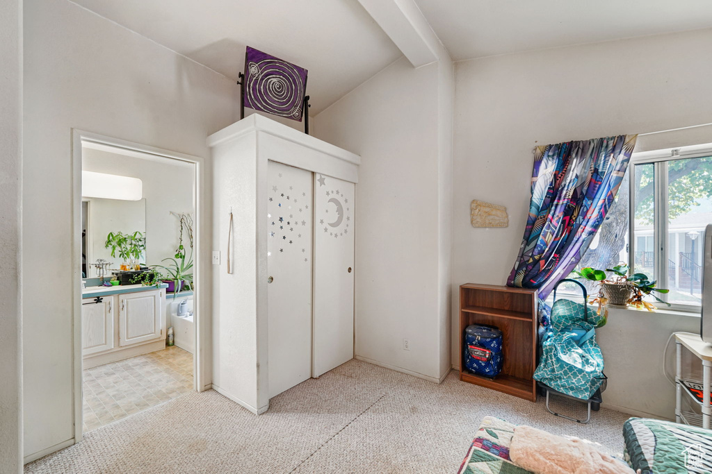 Entrance foyer featuring carpet