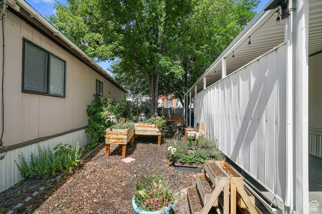 View of yard featuring a vegetable garden