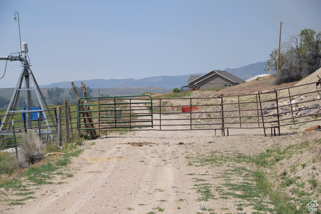View of yard featuring a mountain view and a view of rural / pastoral area