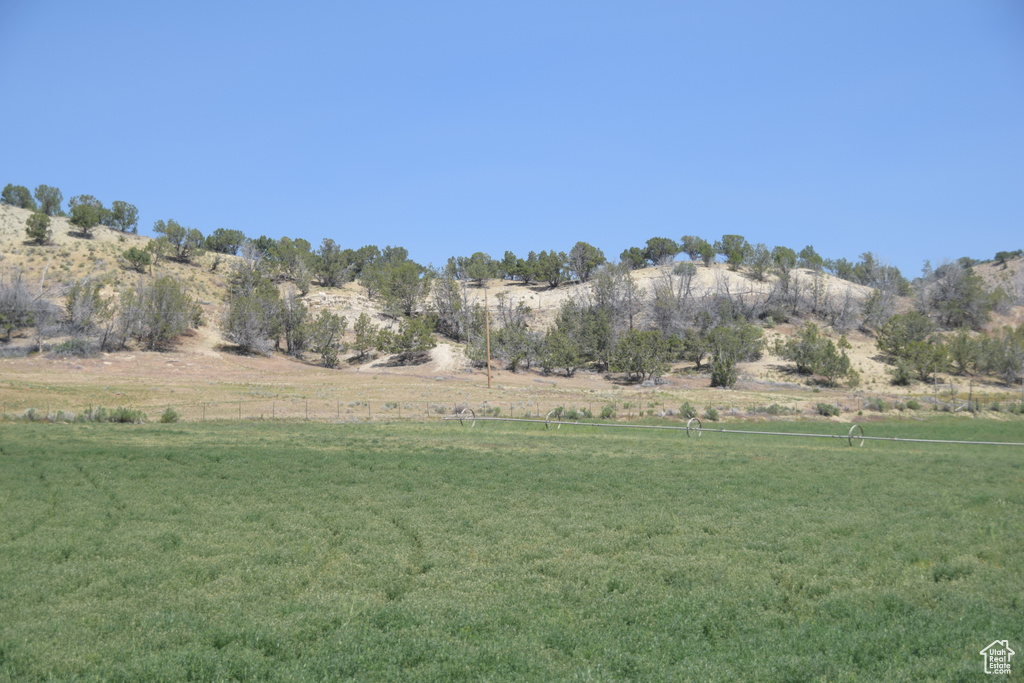 View of grassy yard featuring a view of countryside