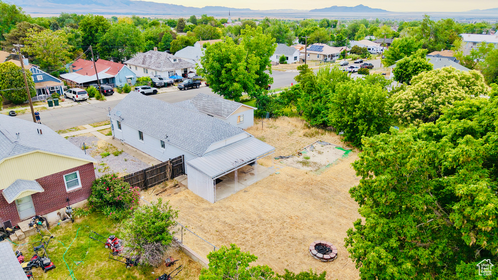 Aerial view of residential area with a mountainous background