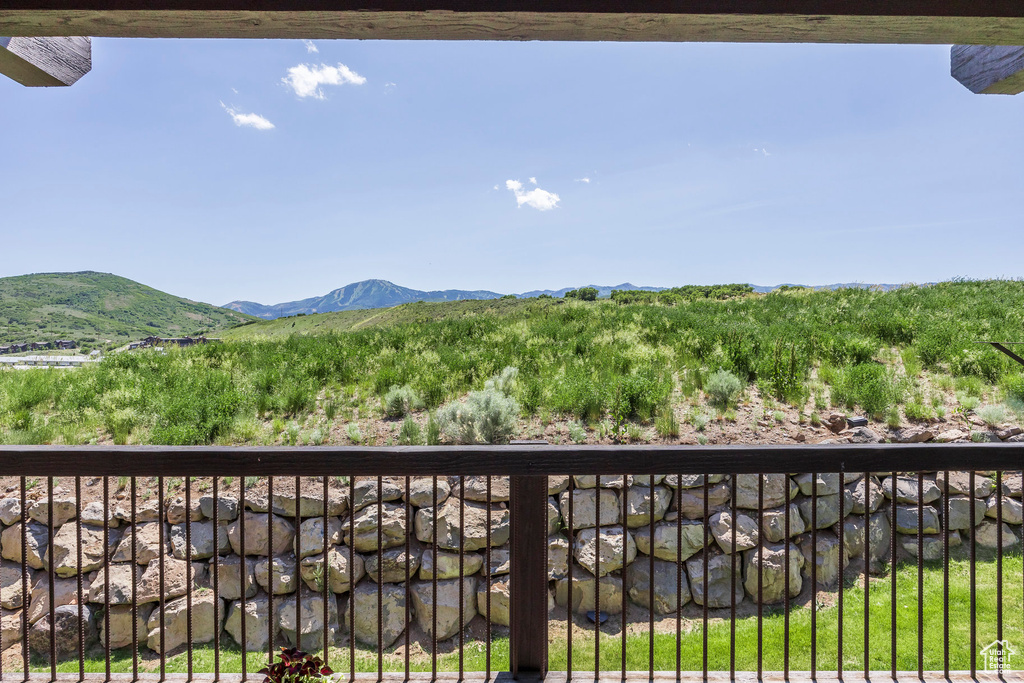 Balcony featuring a mountain view