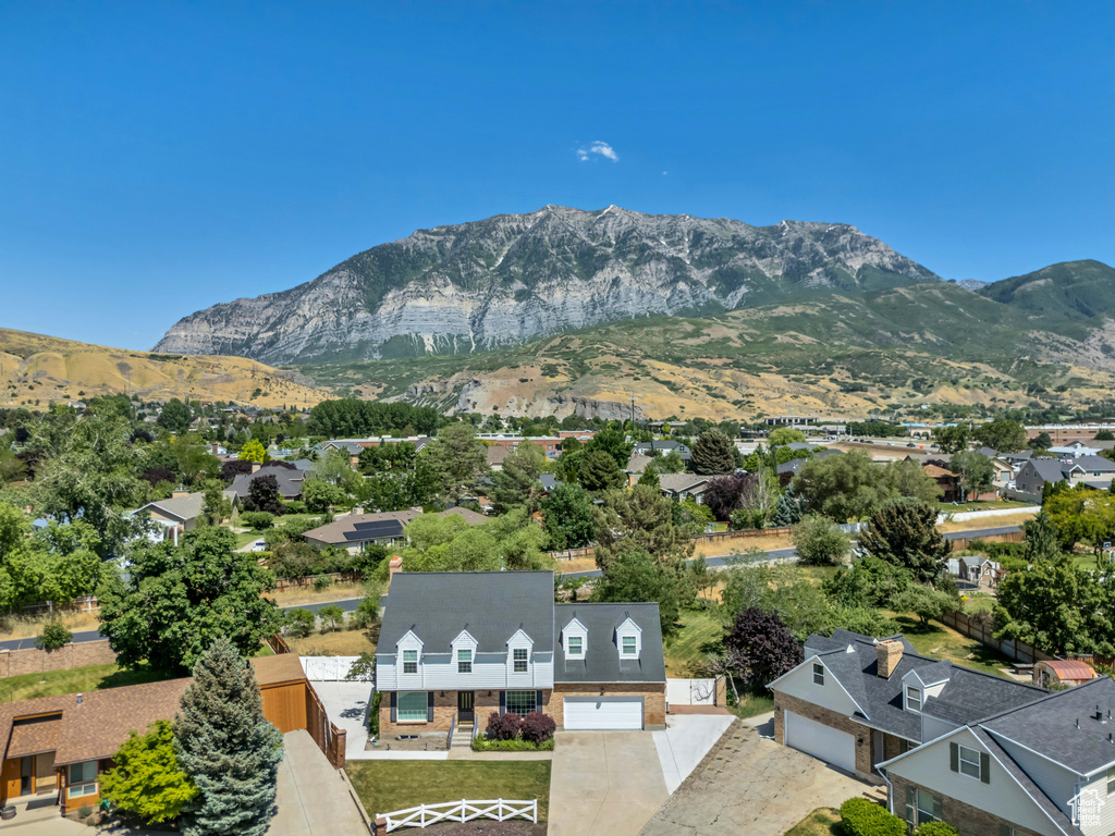 Mountain view featuring nearby suburban area