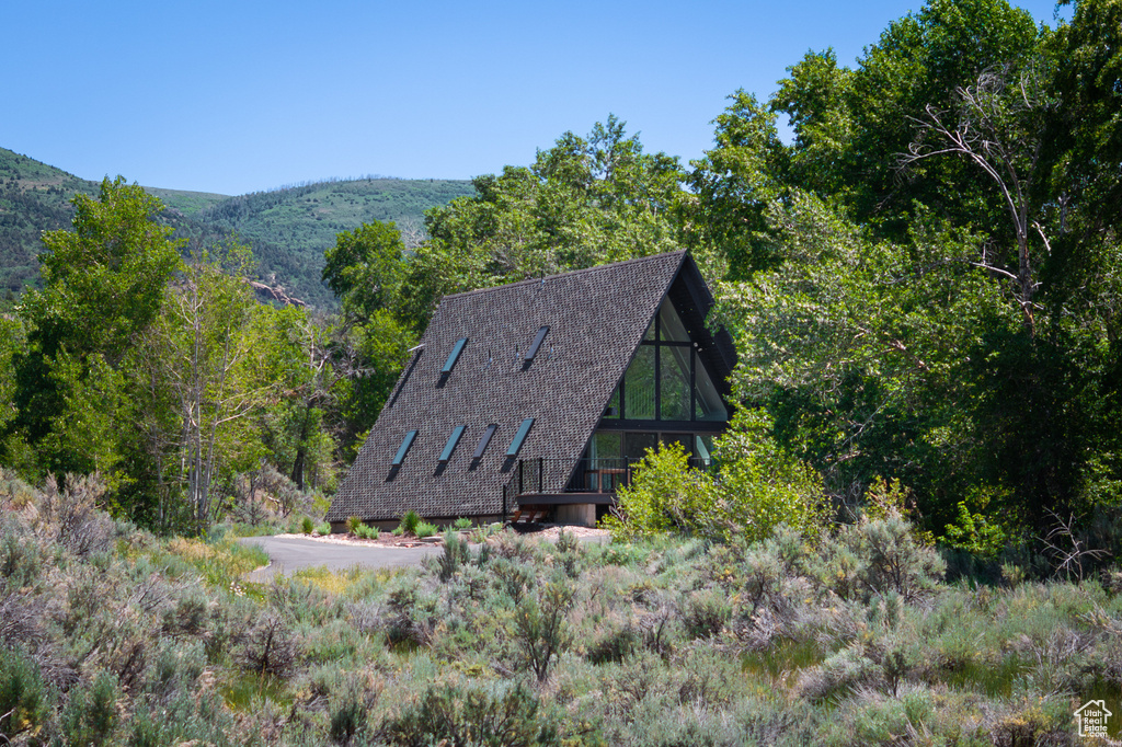 Exterior space with a view of trees