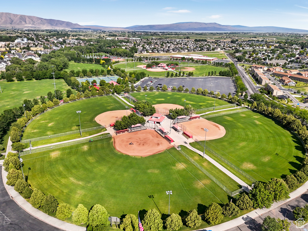 Aerial view of residential area featuring a mountain backdrop
