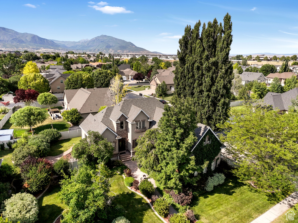 Aerial view of residential area with a mountainous background
