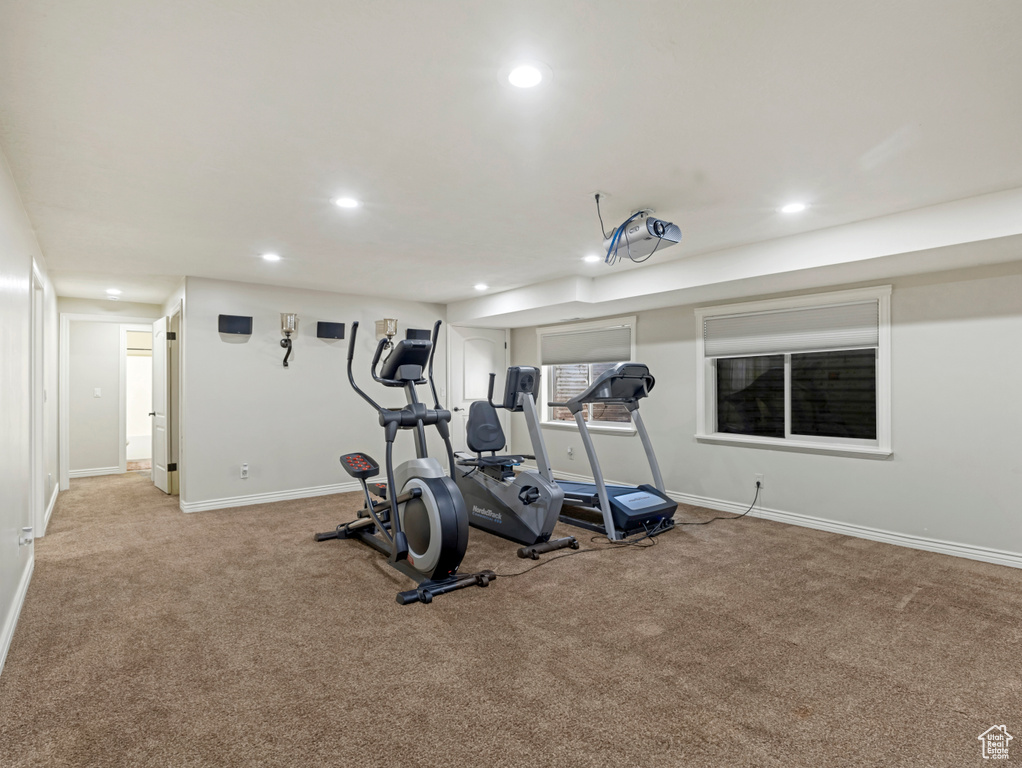 Workout room with recessed lighting and carpet flooring