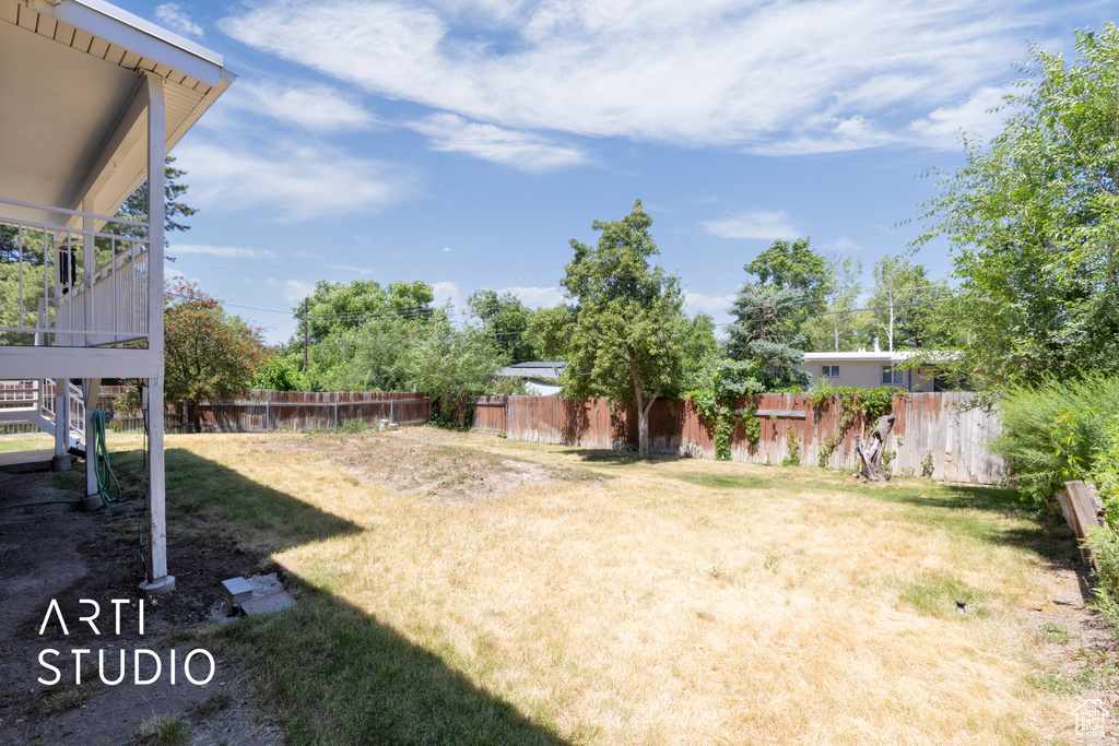 View of fenced backyard