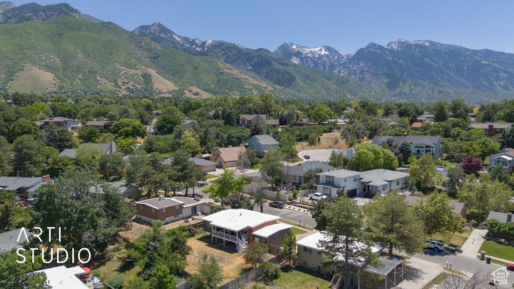 Aerial perspective of suburban area featuring mountains