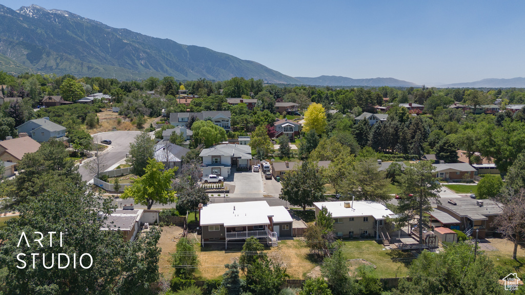 Aerial view of residential area with a mountain backdrop