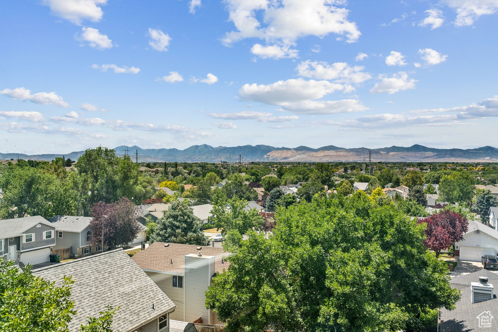 View of mountain background featuring nearby suburban area