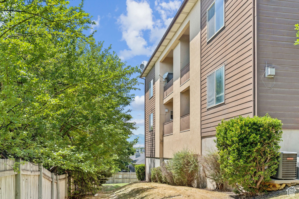 View of home\'s exterior featuring a central air condition unit and stucco siding