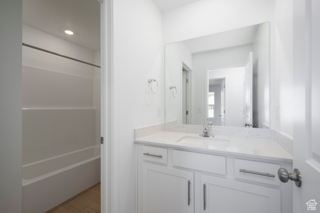 Full bathroom with vanity and shower / bathtub combination